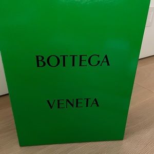 Bottega Veneta box with a rip on one corner of the box
